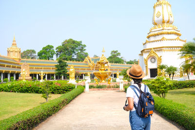 Full length of man outside temple against building