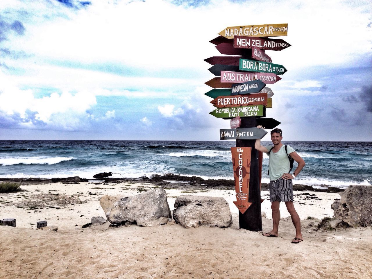 sea, sky, cloud - sky, real people, standing, beach, horizon over water, water, day, leisure activity, full length, casual clothing, nature, beauty in nature, childhood, two people, scenics, vacations, lifestyles, outdoors, sand, men, togetherness, architecture, young adult, people