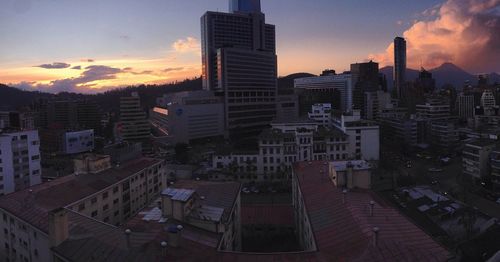 Cityscape against sky during sunset