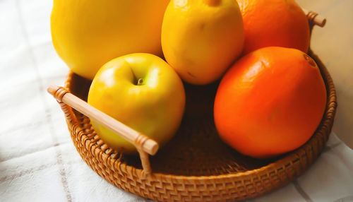 High angle view of oranges in basket