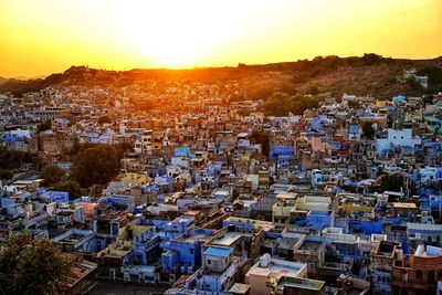 High angle view of townscape against sky at sunset