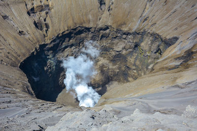 The hole and crater smoke mount bromo, indonesia