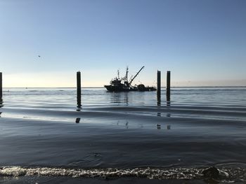 Scenic view of sea against clear sky