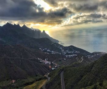 Scenic view of landscape against sky during sunset