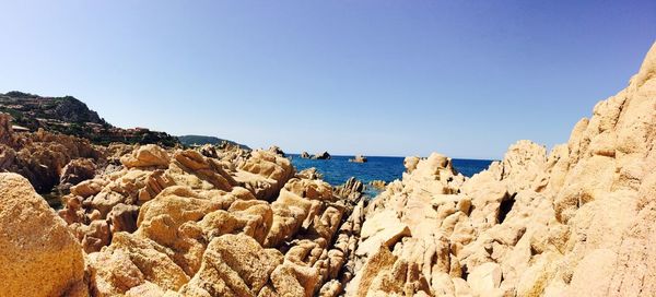 Scenic view of sea against clear sky