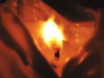 Close-up of illuminated candle