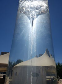 Low angle view of built structure against clear blue sky