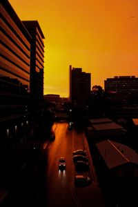 High angle view of traffic on road at sunset