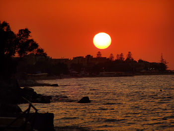Scenic view of sunset over sea