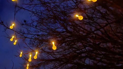 Low angle view of illuminated street light