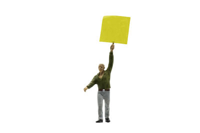 Low angle view of two people standing against white background