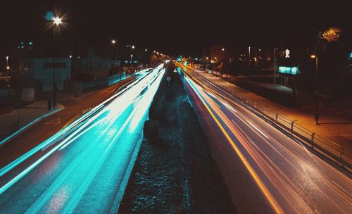 Light trails on street in city at night