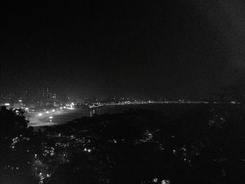 High angle view of illuminated cityscape at night