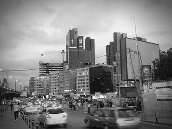 City street against cloudy sky