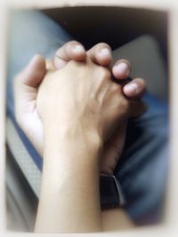 Low section of man with hands