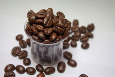 Close-up of coffee beans on table