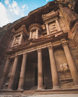 Low angle view of old building against sky