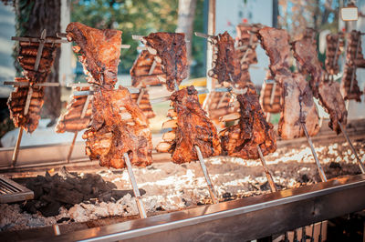 Close-up of meat on barbecue grill