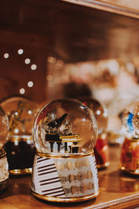 Close-up of snow globe on table