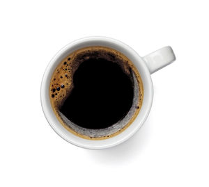 High angle view of coffee cup against white background