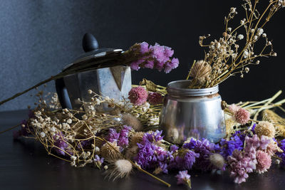 Close-up of purple flowers in vase on table