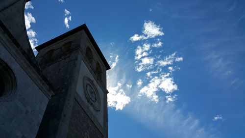 Low angle view of church against blue sky