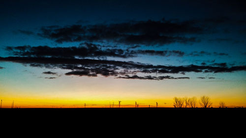 Scenic view of landscape at sunset