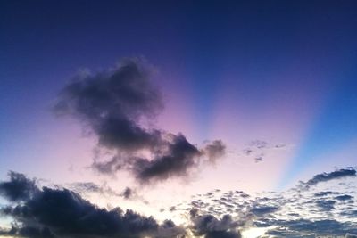 Low angle view of clouds in sky during sunset