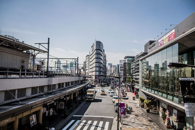 Street amidst buildings against sky