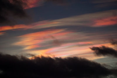 Low angle view of dramatic sky during sunset