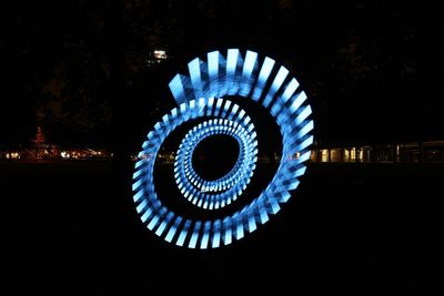 Directly below shot of illuminated building at night