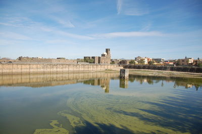 Reflection of buildings on water