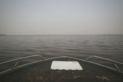 Close-up of cropped boat against calm sea