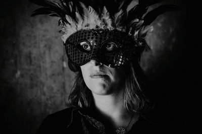 Portrait of young woman wearing mask