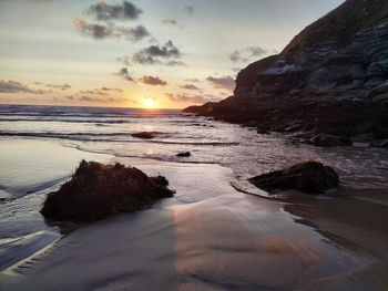 Scenic view of sea against sky during sunset
