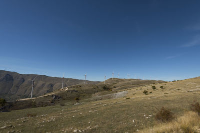 Scenic view of landscape against clear blue sky