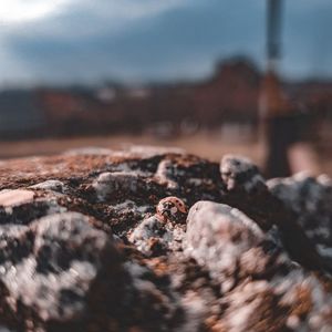 Close-up of rocks against the sky