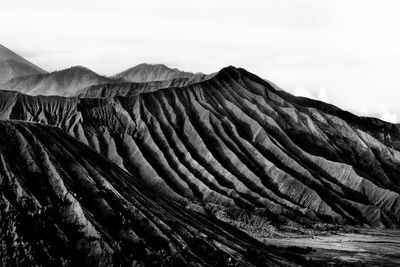 Scenic view of volcanic mountain against sky