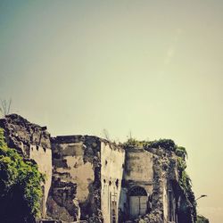 Low angle view of built structure against clear sky