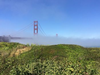 View of suspension bridge against sky