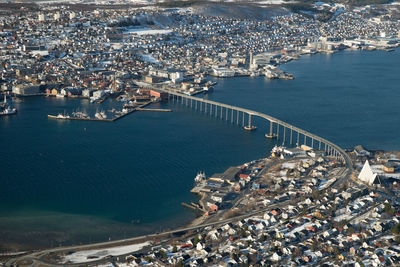 High angle view of cityscape by sea