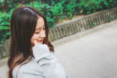 Portrait of woman with eyes closed