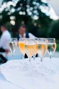 Close-up of champagne flutes on table