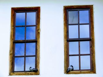 Low angle view of window of old building