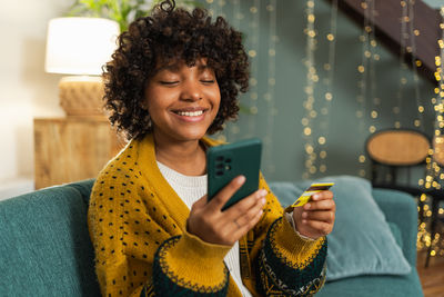 Young woman using mobile phone