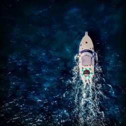 Low angle view of tower in sea