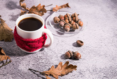 High angle view of coffee cup on table