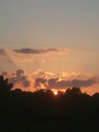 Scenic view of silhouette landscape against sky during sunset