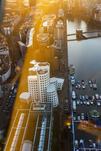 High angle view of illuminated buildings in city