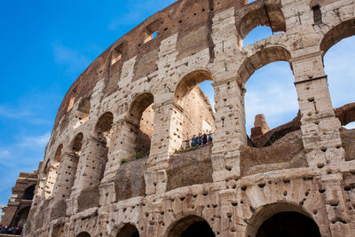 Tourists visiting the famous colosseum or coliseum also known as the flavian amphitheatre